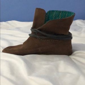 Brown boots with blue and gold detailing